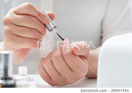 Woman in nails Woman in nails 89943484