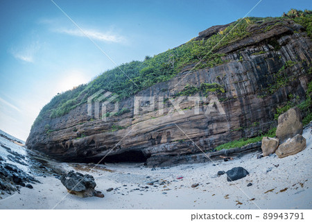 Great cliffs and beautiful beach on Ly Son Island, Quang Ngai Province, Vietnam Great cliffs and beautiful beach on Ly Son Island, Quang Ngai Province, Vietnam 89943791