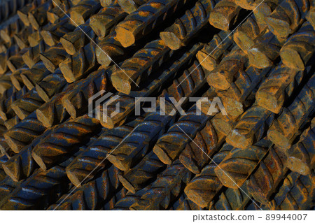 metal reinforced concrete bars rusty rods stack close-up construction material 89944007
