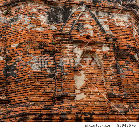Root of the tree on red brick wall background. Root of the tree on red brick wall background. 89945670
