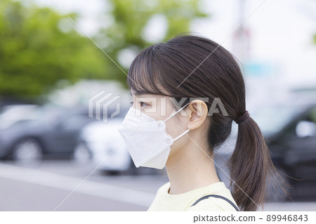 Young lady in mask shape 89946843