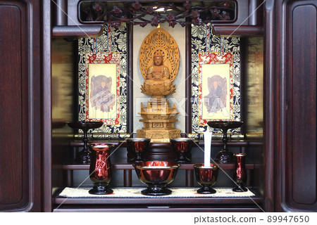 A sitting statue of Buddha and modern Buddhist altars displayed in a small Buddhist altar 1 A sitting statue of Buddha and modern Buddhist altars displayed in a small Buddhist altar 1 89947650
