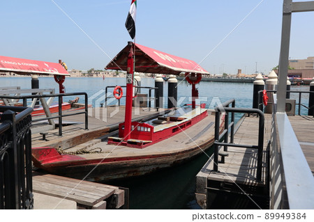 Dubai canal and arab ship 89949384