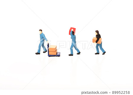 Miniature worker carrying box on white background 89952258