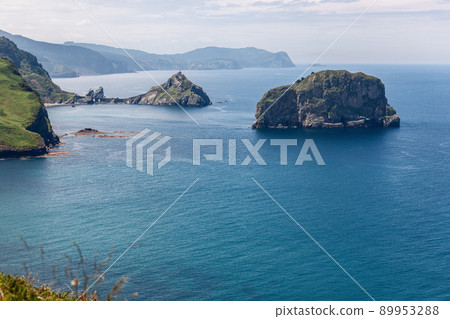 Part of Bay of Biscay with 2 little islets Gaztelugatxe and Aketx 89953288