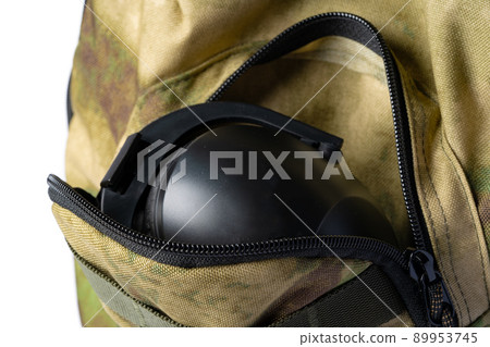 Open military backpack of khaki color on a white background Open military backpack of khaki color on a white background 89953745