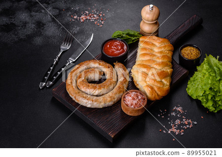 Baked homemade sausage with spices and herbs, close up 89955021