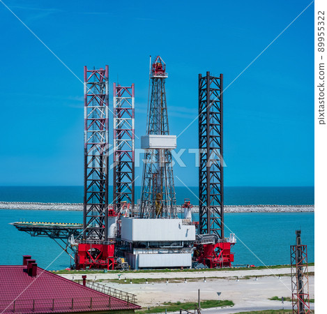 floating oil platform moored in the seaport at the pier 89955322