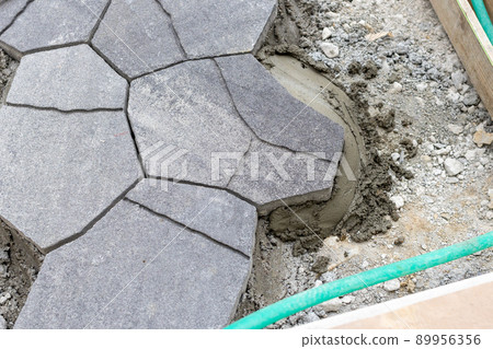 Exterior construction of a newly built single-family house Exterior construction of a newly built single-family house 89956356