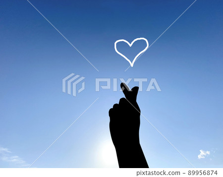 Heart mark on Kyun's hand silhouette 89956874