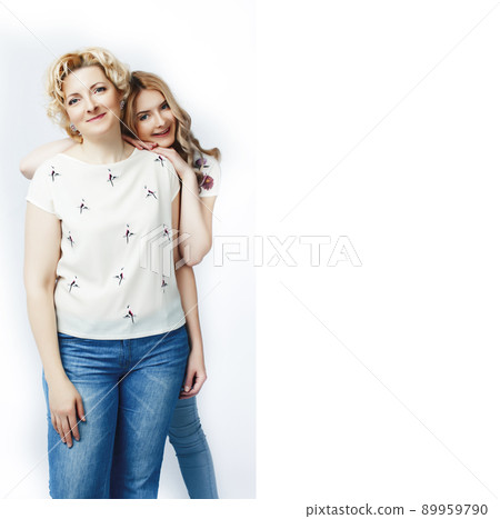 mother with daughter together posing happy smiling isolated on white background with copyspace, lifestyle people concept close up mother with daughter together posing happy smiling isolated on white background with copyspace, lifestyle people concept close up 89959790