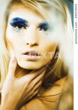 beauty young snow queen in fairy flashes close up 89959945