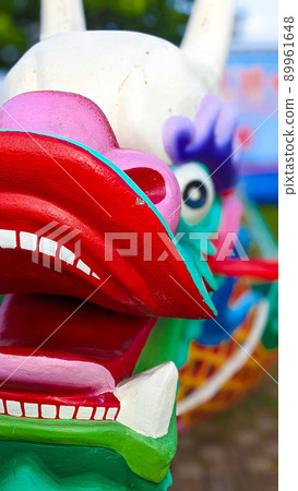 Dragon boat by the fishing port Dragon boat by the fishing port 89961648