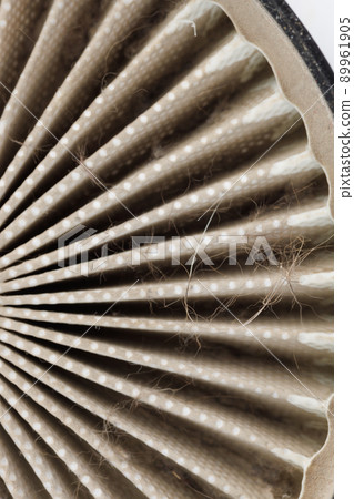 dust, hairs and fur on radial HEPA filter, close-up with selective focus 89961905