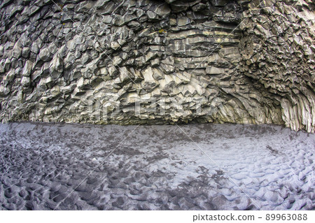 Basalt columns on a black reynisfjara beach in Iceland 89963088