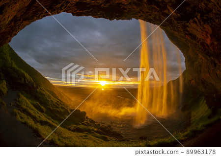 Seljalandsfoss waterfall at sunset. Iceland Seljalandsfoss waterfall at sunset. Iceland 89963178