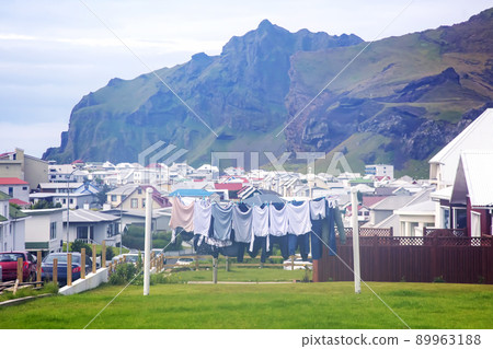 View of the houses and buildings on the Heimaey Island of the Vestmannaeyjar Archipelago. Iceland View of the houses and buildings on the Heimaey Island of the Vestmannaeyjar Archipelago. Iceland 89963188