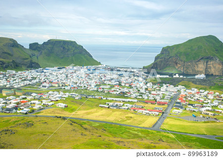 View of the houses and buildings on the Heimaey Island of the Vestmannaeyjar Archipelago. Iceland View of the houses and buildings on the Heimaey Island of the Vestmannaeyjar Archipelago. Iceland 89963189
