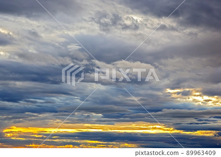 Unrealistic colorful sunset in the lush clouds in Iceland 89963409