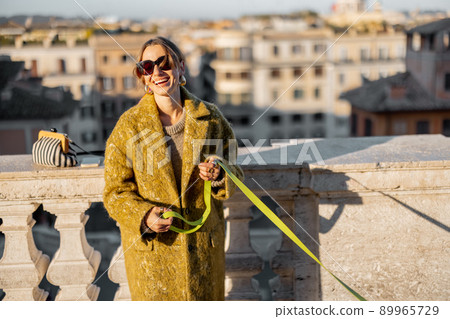 Woman enjoying beautiful morning cityscape of Rome Woman enjoying beautiful morning cityscape of Rome 89965729