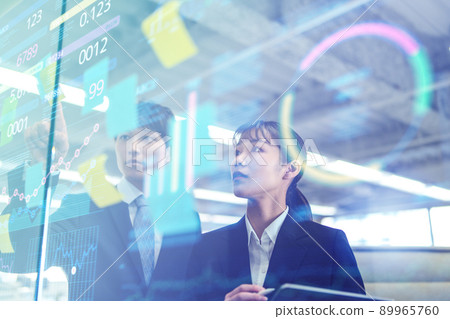 Business person (suit) working in the office Business person (suit) working in the office 89965760