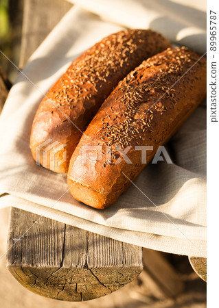 Two loaves of black bread 89965787