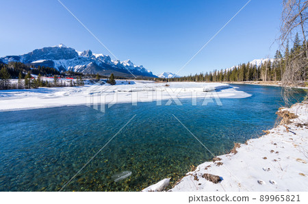Superb view of Canmore in winter, Bow River, Canadian Rockies, Alberta, Canada 89965821