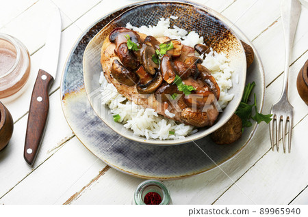 Chicken breast with marsala sauce and rice Chicken breast with marsala sauce and rice 89965940