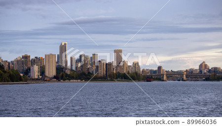 Modern City, Stanley Park, Buildings, beach and Burrard Bridge in False Creek on the West Coast of Pacific Ocean. Modern City, Stanley Park, Buildings, beach and Burrard Bridge in False Creek on the West Coast of Pacific Ocean. 89966036
