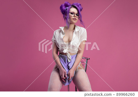 sexy schoolgirl girl with purple hair in summer short clothes and beautiful underwear on a pink background sexy schoolgirl girl with purple hair in summer short clothes and beautiful underwear on a pink background 89966260