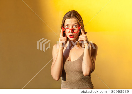 What?! No way! People emotions and feelings. Handsome freckled young adult girl, looking at camera with wonder face. What?! No way! People emotions and feelings. Handsome freckled young adult girl, looking at camera with wonder face. 89968989