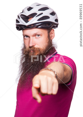 funny happy european bearded cyclist wearing helmet with pink or purple t shirt. advise people to protection. studio shot. isolated on white. 89969531