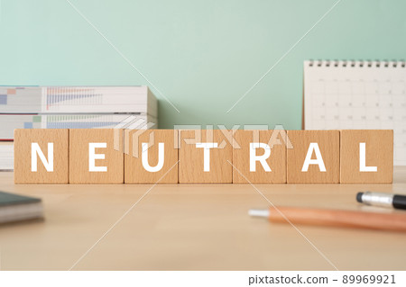 Neutral / neutral image | Desk with building blocks with "NEUTRAL" written on it 89969921