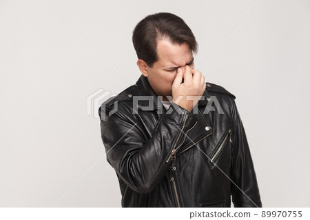 Cry and unhappy concept. Depression man cry and hysterics. Studio shot, gray background Cry and unhappy concept. Depression man cry and hysterics. Studio shot, gray background 89970755