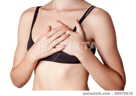young woman with holding chest, pain on heart on white background. young woman with holding chest, pain on heart on white background. 89970839