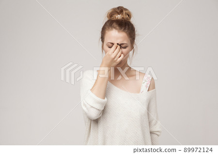 Sadness woman cry and have a hysterics. Studio shot Sadness woman cry and have a hysterics. Studio shot 89972124