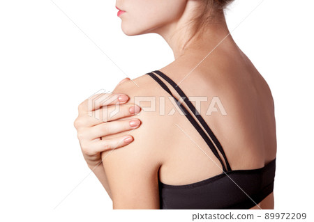 young woman with pain on her arm and shoulder on white background. 89972209