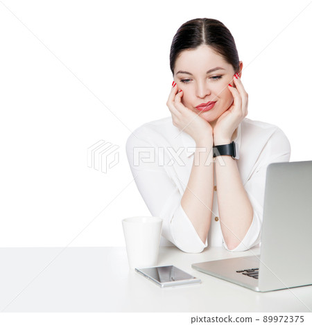 Portrait of dissatisfied or sad brunette businesswoman in white shirt sitting with laptop touching her face and thinking or confused and thinking. indoor studio shot, isolated in white background. Portrait of dissatisfied or sad brunette businesswoman in white shirt sitting with laptop touching her face and thinking or confused and thinking. indoor studio shot, isolated in white background. 89972375