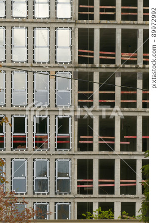 Facade of the house with partially inserted glass Facade of the house with partially inserted glass 89972992