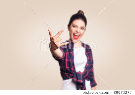 Rock sign. Happy funny toothy smiley young - Stock Photo