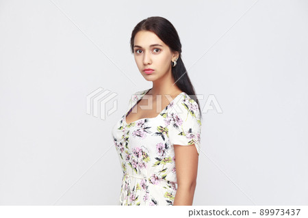 Portrait of unhappy and stressed girl. Studio shot Portrait of unhappy and stressed girl. Studio shot 89973437