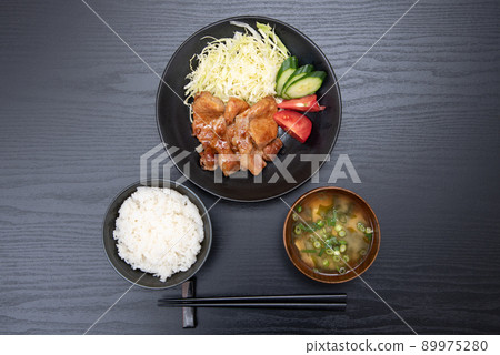 Homemade pork ginger-grilled set meal taken on a black background 89975280