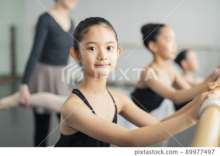 Ballet classroom teacher and children Ballet classroom teacher and children 89977497