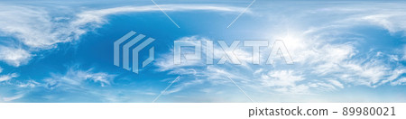 Blue sky with light clouds Seamless panorama in spherical equirectangular format with complete zenith for use in 3D graphics, game and for composites in aerial drone 360 degree panoramas as a sky dome Blue sky with light clouds Seamless panorama in spherical equirectangular format with complete zenith for use in 3D graphics, game and for composites in aerial drone 360 degree panoramas as a sky dome 89980021
