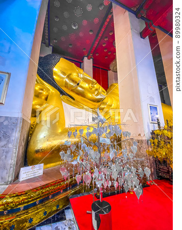 Wat Phra Non Chak Si Worawihan or Wat Phra Non Chakkrasi Worawihan, big reclined Buddha, in Sing Wat Phra Non Chak Si Worawihan or Wat Phra Non Chakkrasi Worawihan, big reclined Buddha, in Sing 89980324