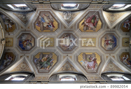 The evangelists, fresco on the ceiling of Santa Maria in Aquiro church in Rome, Italy The evangelists, fresco on the ceiling of Santa Maria in Aquiro church in Rome, Italy 89982054