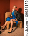 young girl posing at camera, full length portrait 89984179