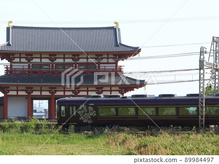 Kintetsu's sightseeing limited express "Ayoyoshi" that runs inside the site of the world heritage Nara Heijo Palace 89984497