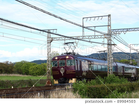 Kintetsu's sightseeing limited express "Ayoyoshi" that runs inside the site of the world heritage Nara Heijo Palace 89984503