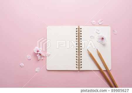 Cherry petals and ring notes and pencils Cherry petals and ring notes and pencils 89985627